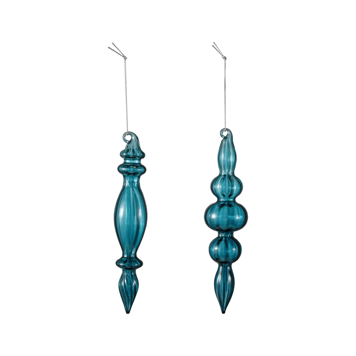 Two teal blue glass finial ornaments with elongated, ribbed silhouettes and silver hanging strings.
