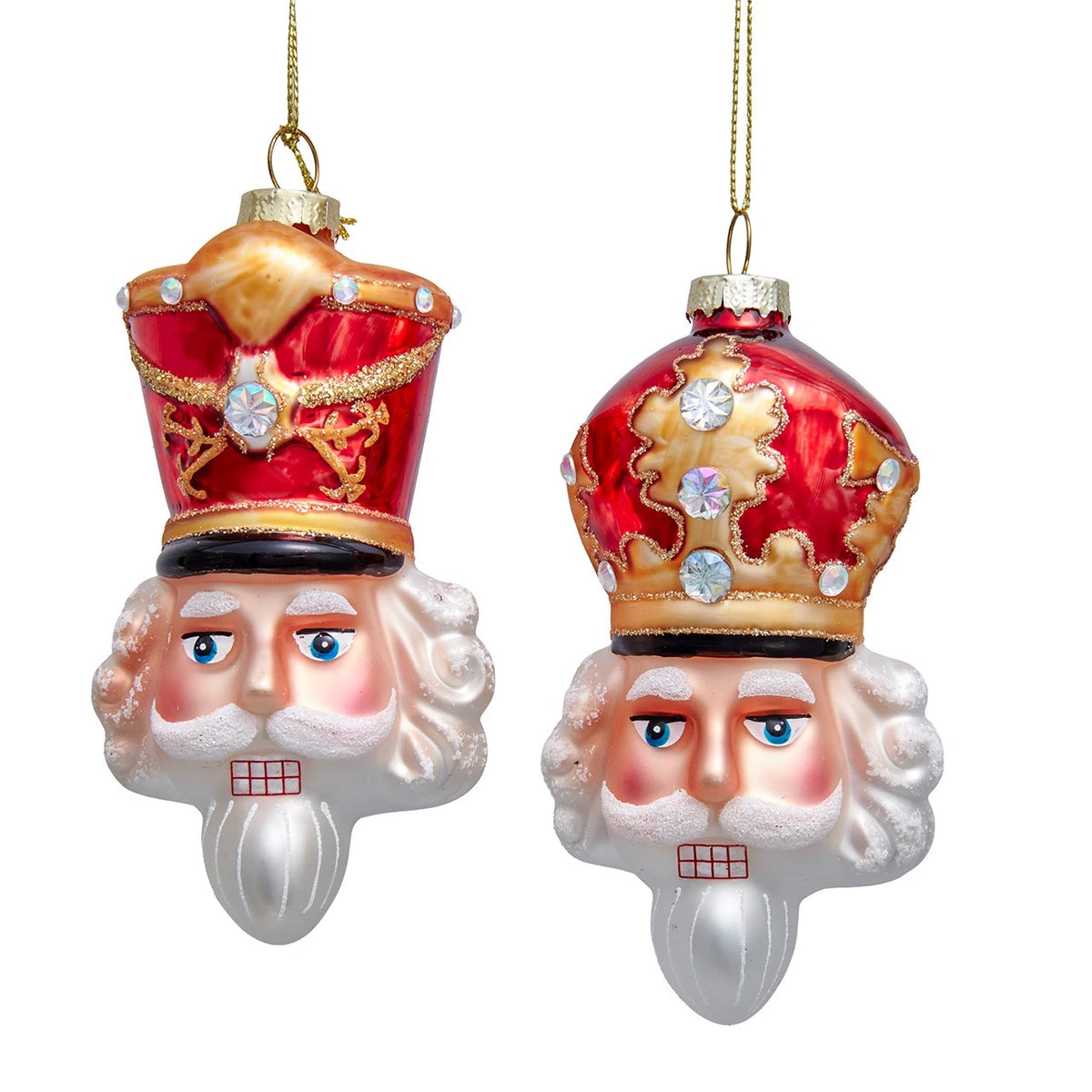 Two glass king nutcracker head ornaments with red and gold crowns, glitter, and gemstone accents.