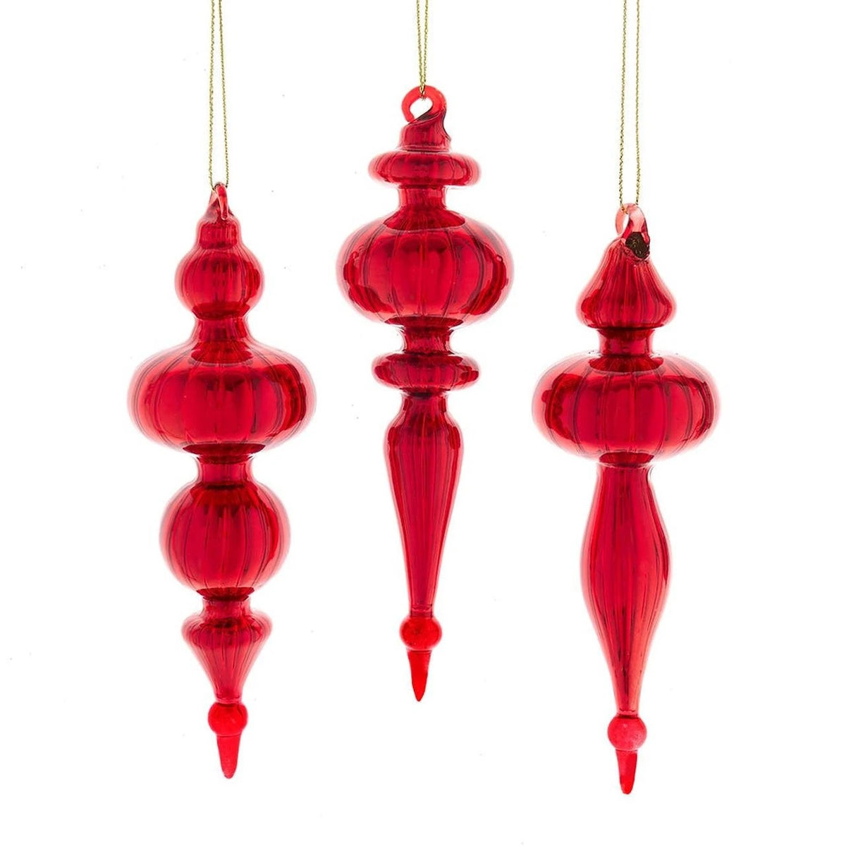 Three elegant red glass finial ornaments with ribbed textures hanging from gold strings.