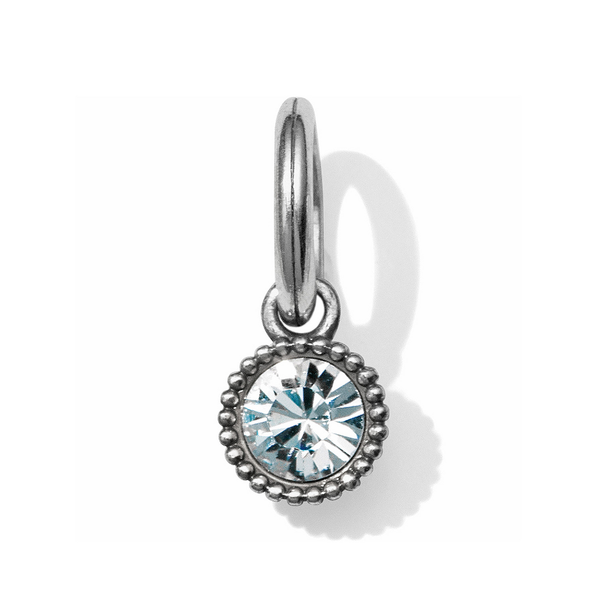 Glitz Birthstone Amulet in silver with a round clear crystal and beaded edge detail.