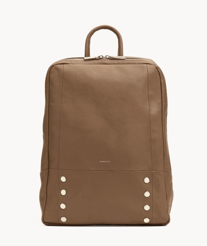 Hammitt Hunter Large Backpack in Dune leather with silver rivets and a top handle.