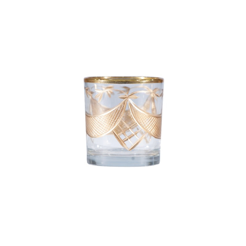 Hand-painted etched glass tealight holder with gold swag design and rim on a clear base.