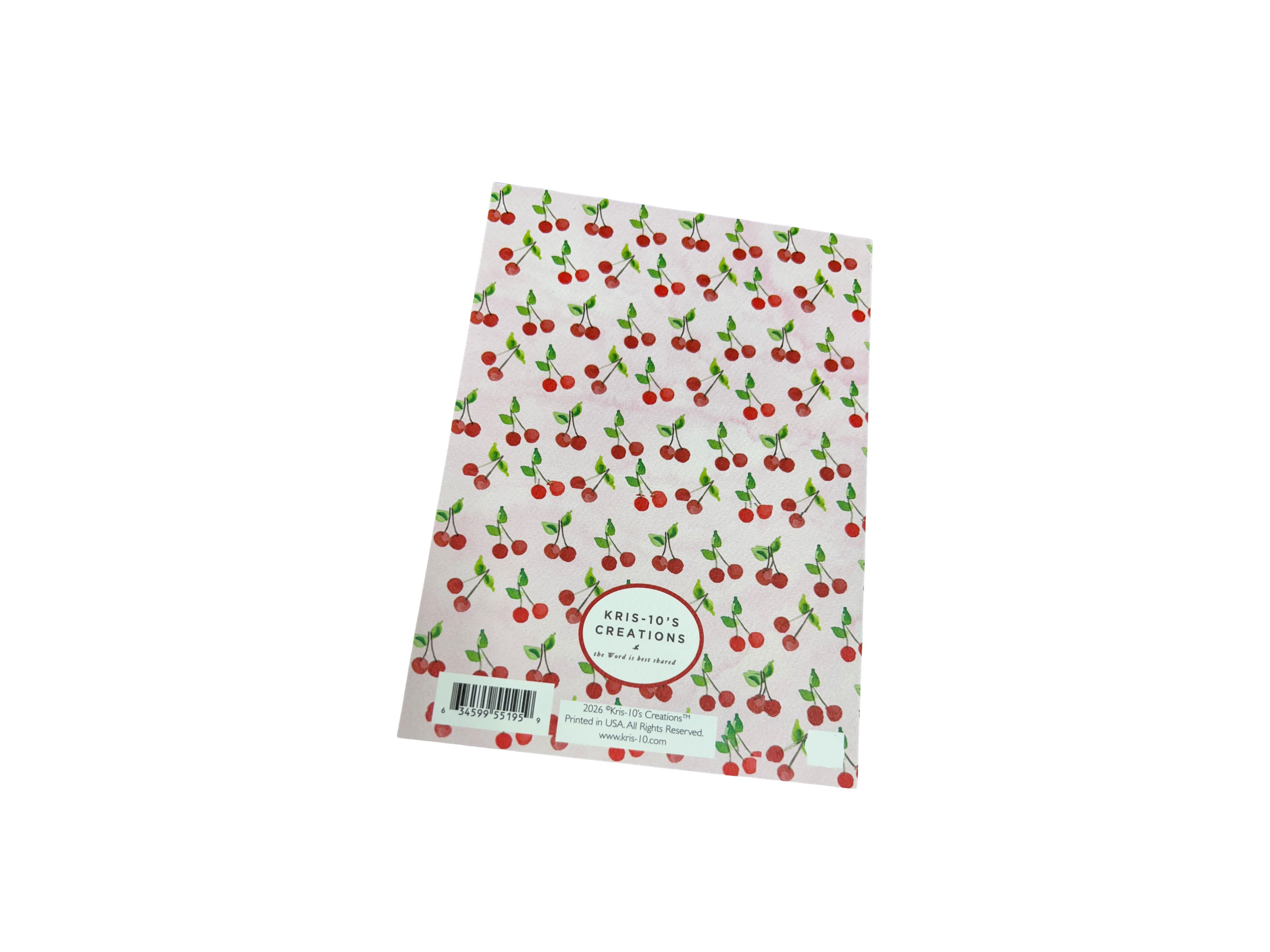 Back of a Birthday Hearts Card featuring a red cherry pattern on a light pink background.