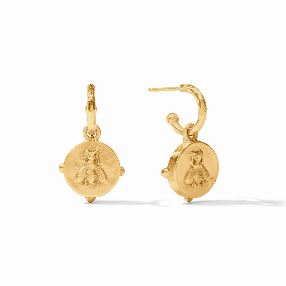 Gold honeybee hoop earrings with a detailed bee cameo charm on a textured gold disc.