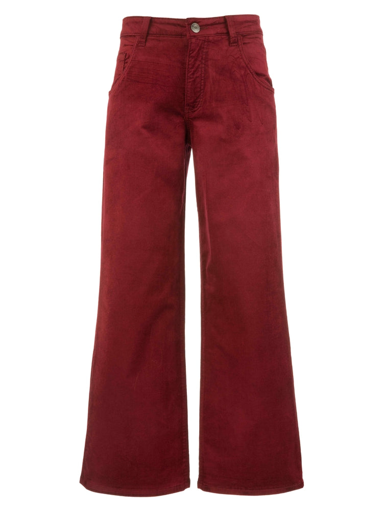 Cranberry red high-rise flare jeans with a button closure and wide leg opening.
