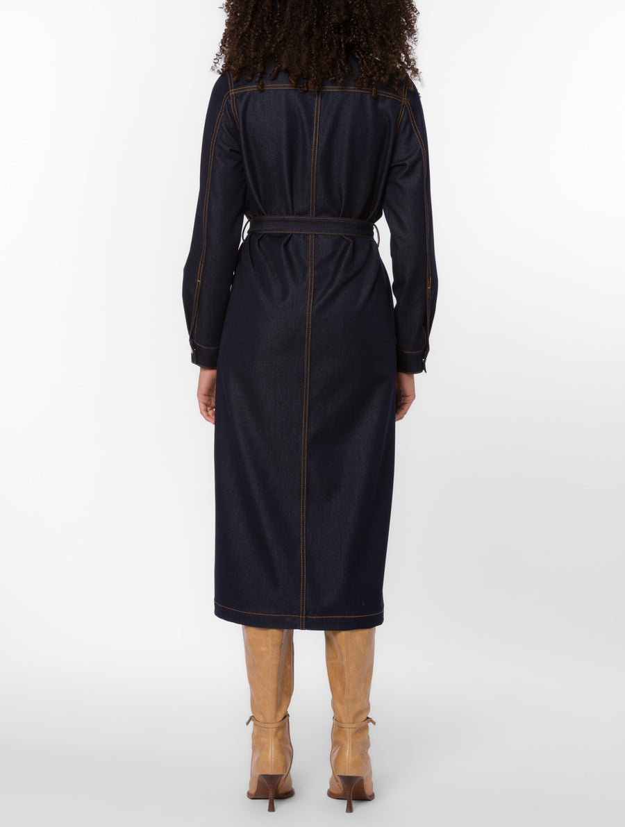 Back view of a midi-length dark-wash indigo denim dress with contrast stitching and a waist belt.