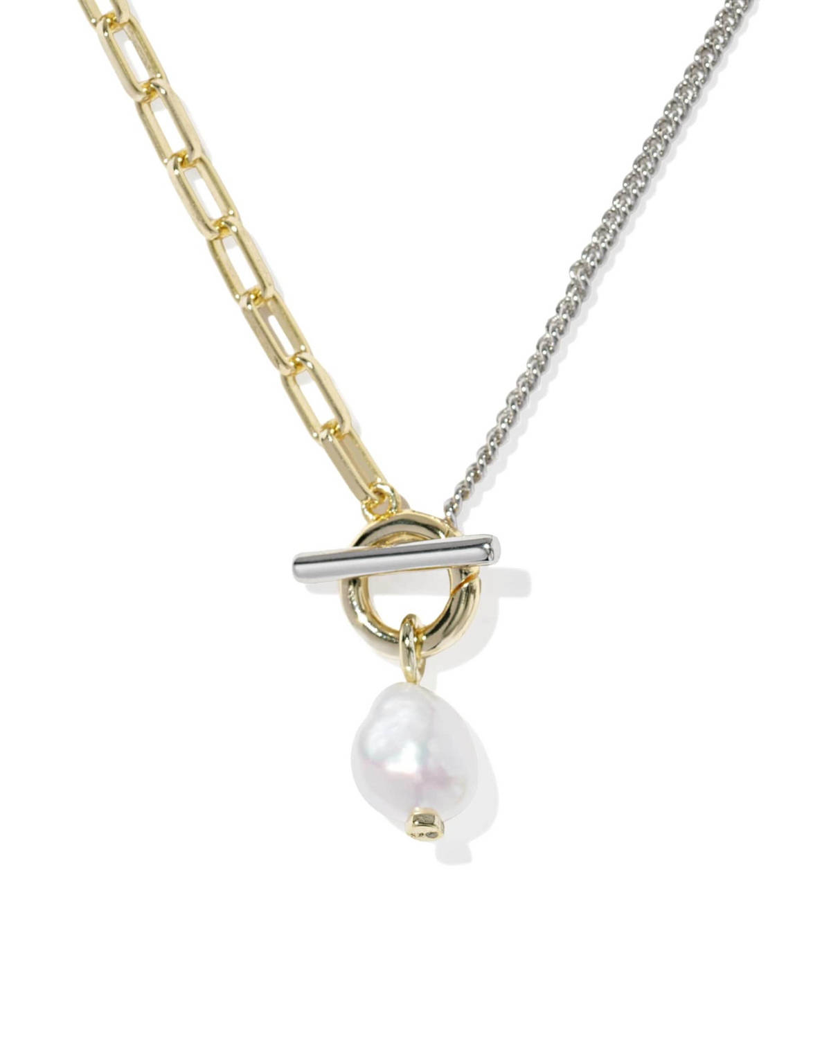 Mixed metal chain necklace with a gold paperclip link, silver curb chain, and a pearl charm.