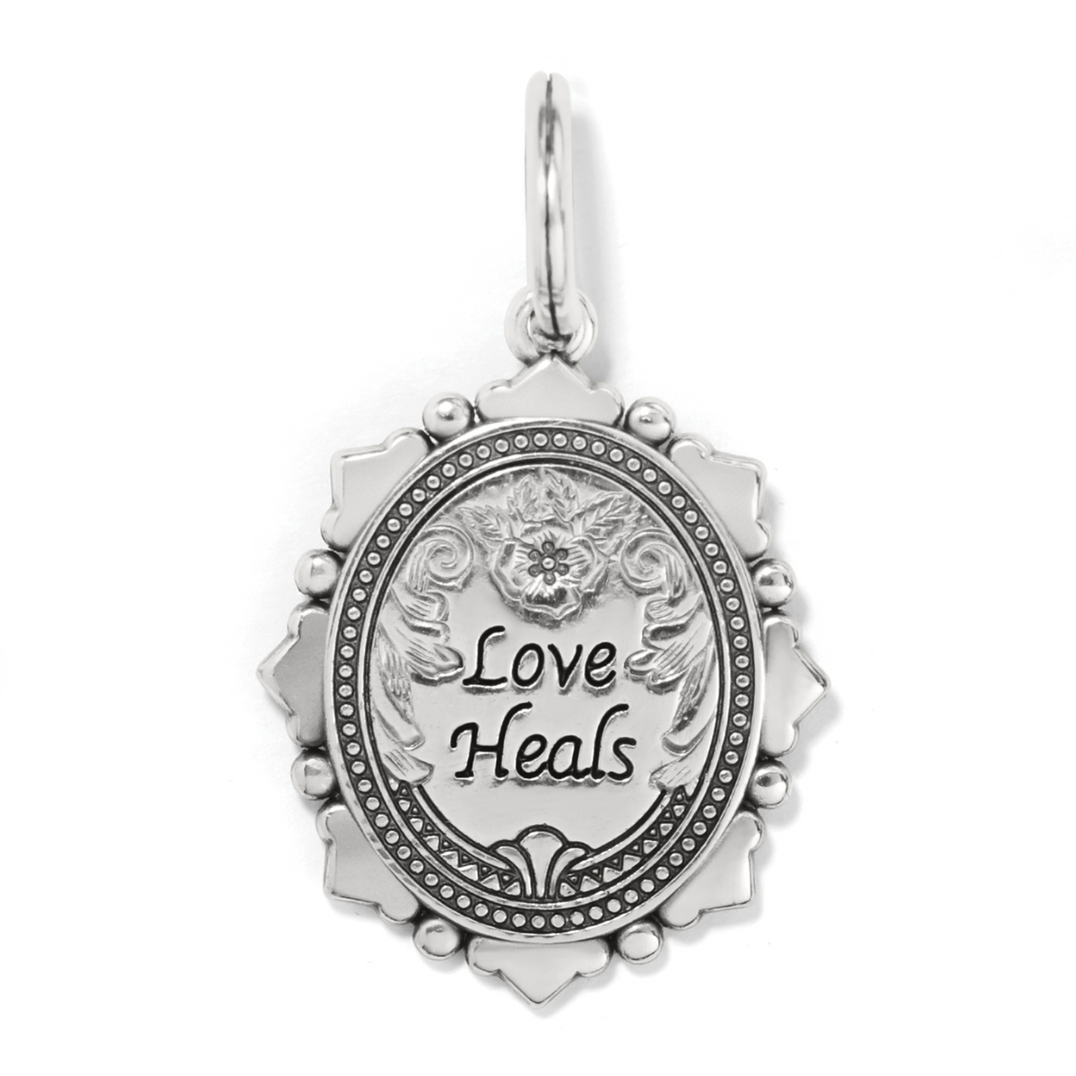 Silver oval Love Heals Amulet with ornate floral engraving and beaded border.