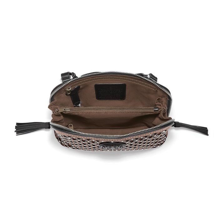 Interior view of the Lucille Domed Organizer showing brown lining, zip pocket, and leather patch.