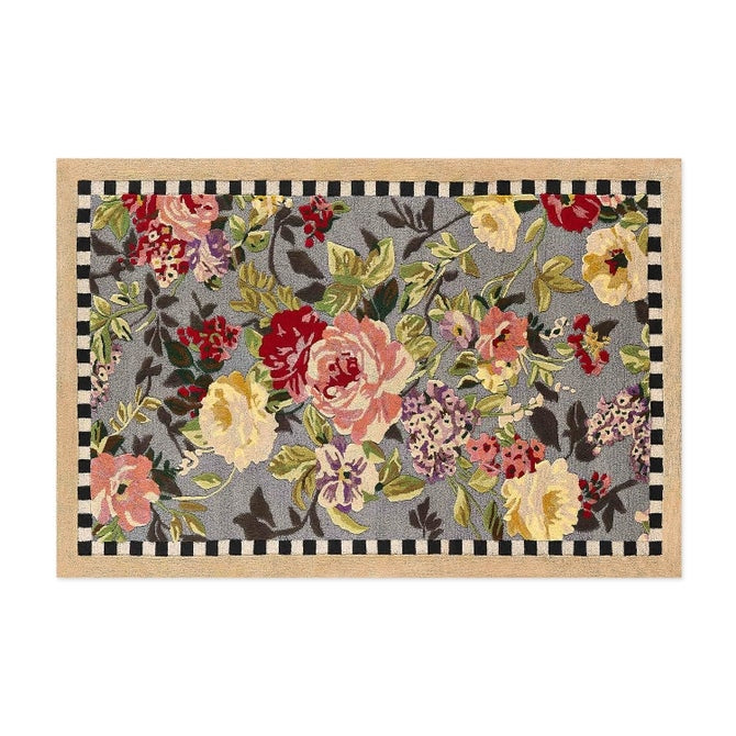 Mackenzie Childs Tudor Rose rug with red floral pattern on cream background