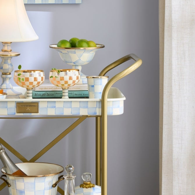 Hand-glazed steel tumbler with hand-painted sky blue checks on a bronzed stainless rim