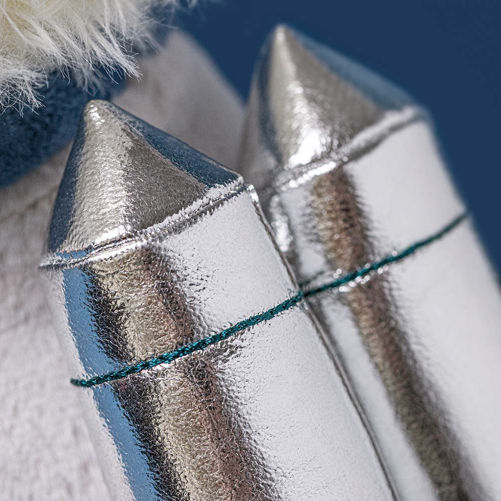 Close-up of the shiny silver rocket pack on the Munro Scottie Dog Space Outfit.