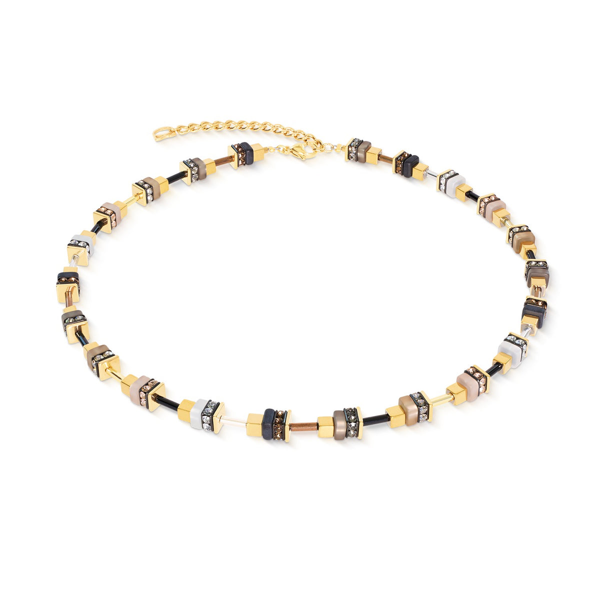 Necklace with beige, gold, black, and white cubes and rhinestone rondelles on a gold-plated chain.