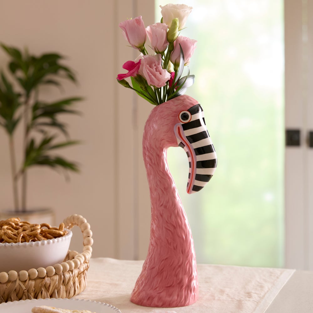 Patience Brewster Flamingo Ceramic Vase with pink feathers and a black and white striped beak.
