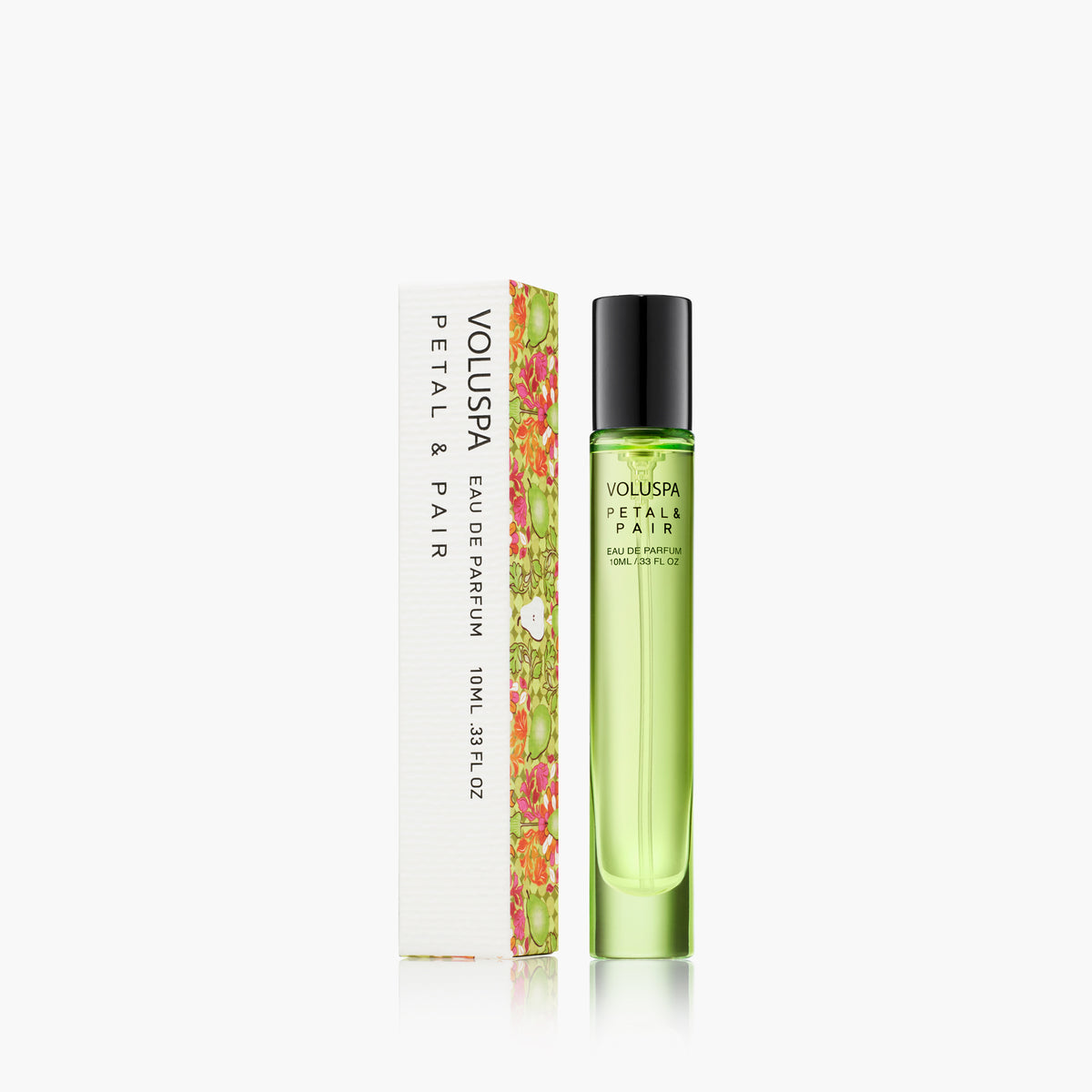 Petal & Pair 10ml Eau De Parfum in a green glass travel spray bottle next to its floral box.