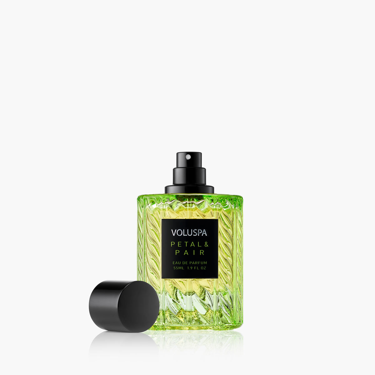 Voluspa Petal & Pair 55ml Eau De Parfum in a textured green glass bottle with a black cap.