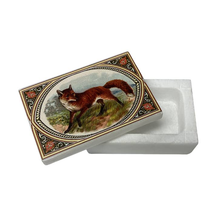 Red fox vintage print on a rectangular white soapstone jewelry storage box with an open lid.