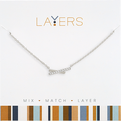 Silver petite crossover layer necklace with delicate chain links.