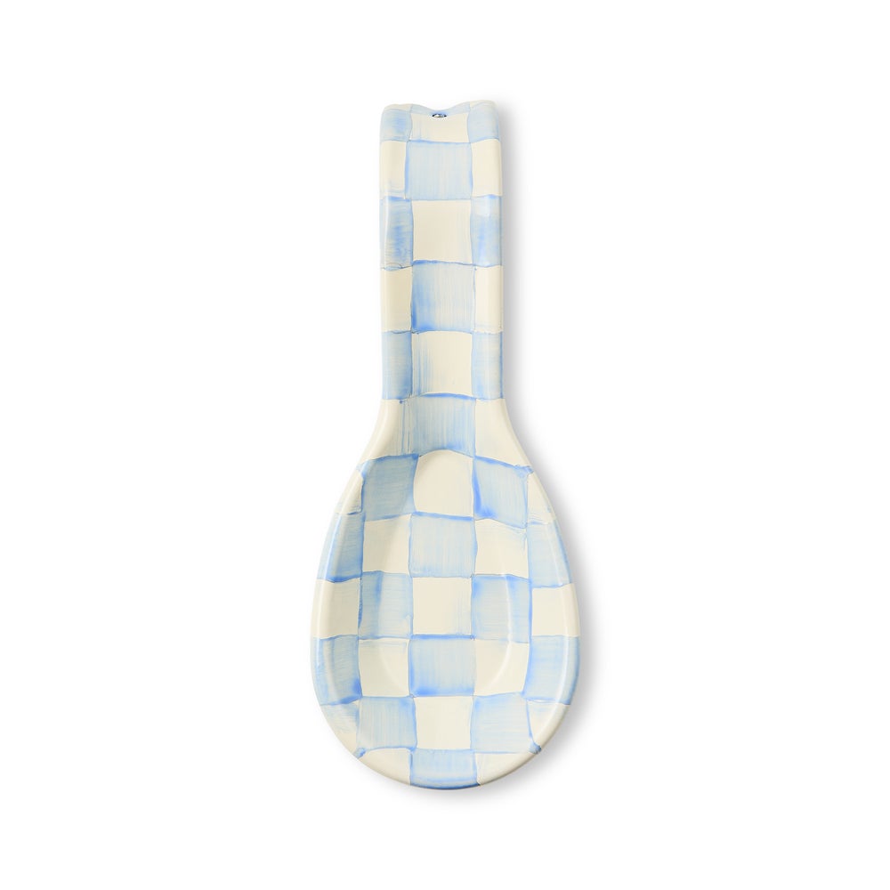 Sky Check Spoon Rest featuring hand-painted light blue and white checks on a curved enamel surface.