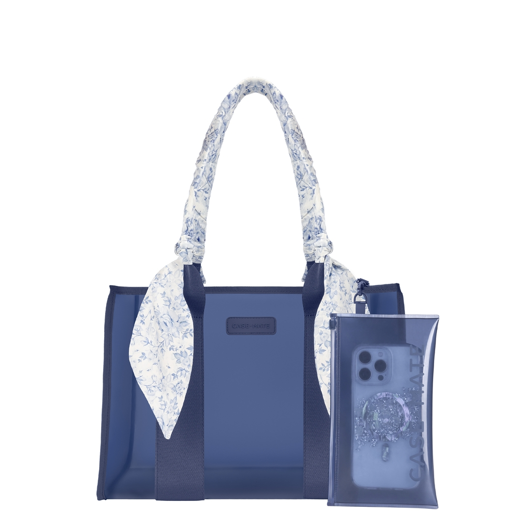 Blue Jelly Tote Bag Medium with floral bow handle and matching small zipper pouch.