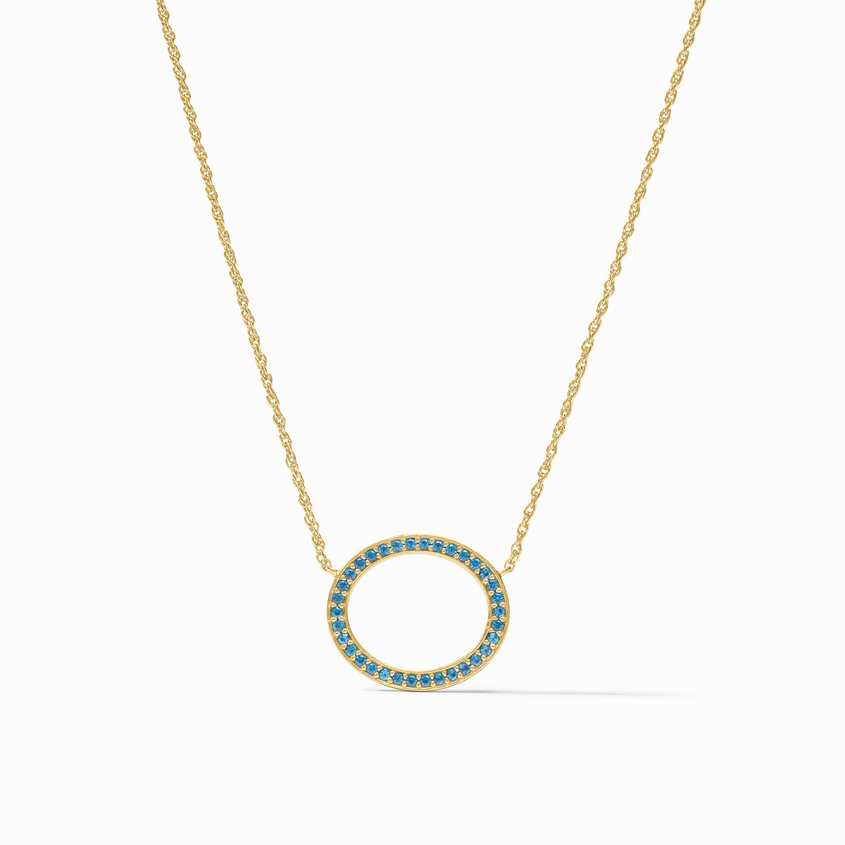 Stardust Delicate Necklace in 24K gold plate with a circular pendant set with blue CZ stones.