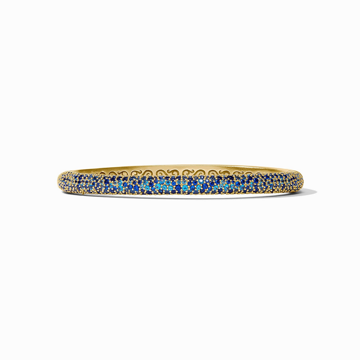 Stardust Hinge Bangle in 24K gold plate with sapphire blue CZ stones.