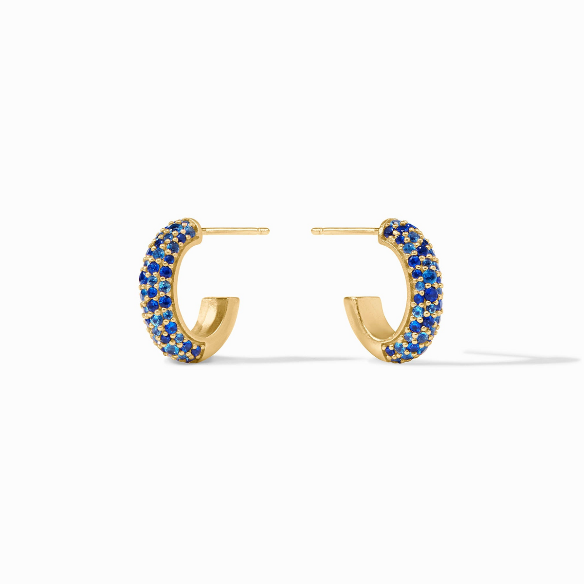 Small 24K gold plated Stardust Hoop earrings with sapphire blue cubic zirconia pavé detailing.