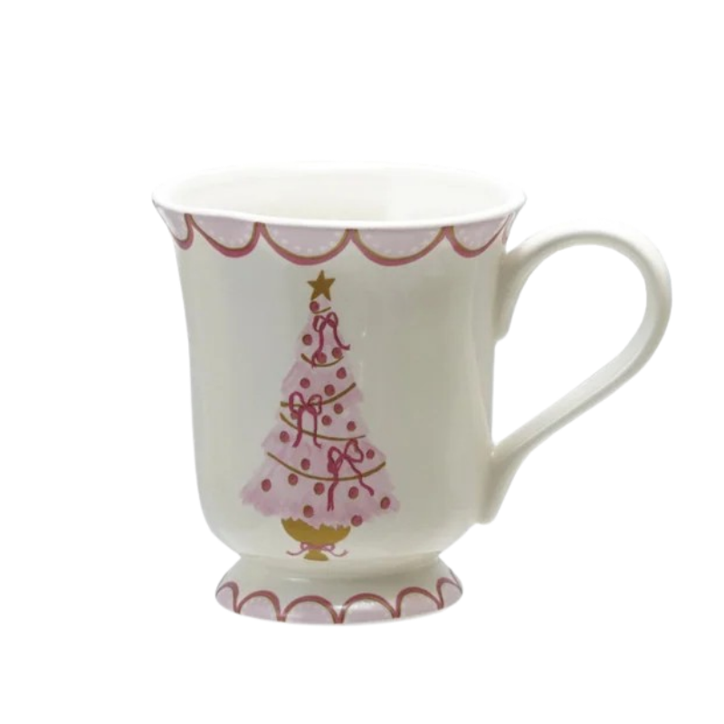 White stoneware mug with a pink Christmas tree, bows, and scalloped trim.