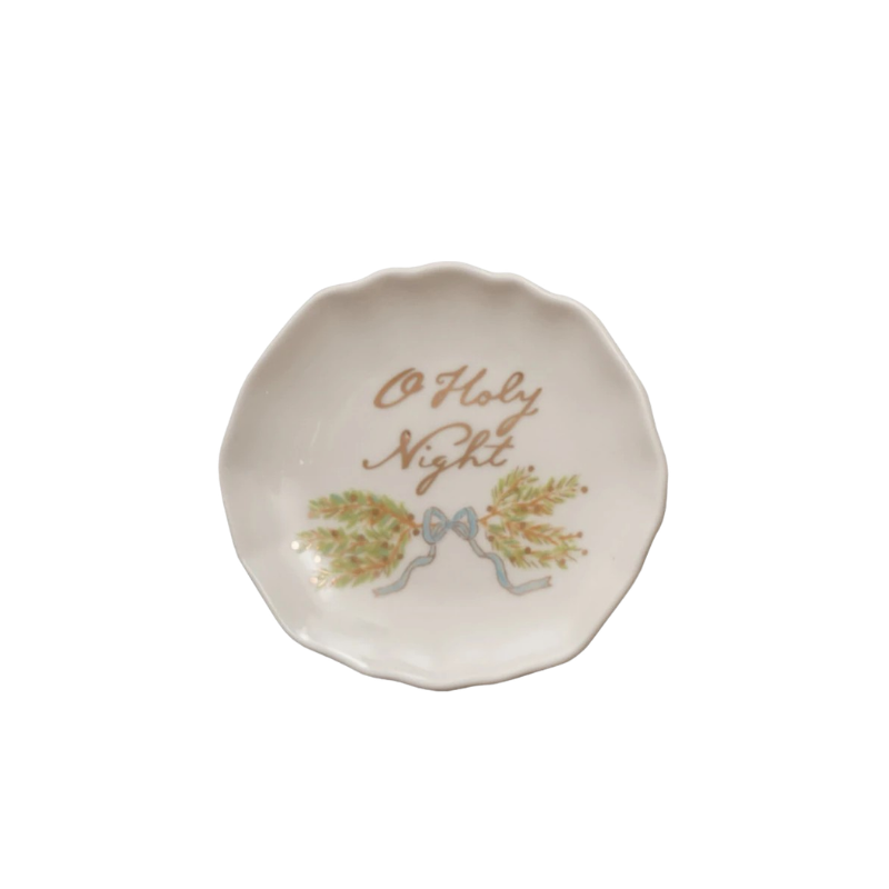 Scalloped stoneware plate with gold 'O Holy Night' script and a festive pine branch design.