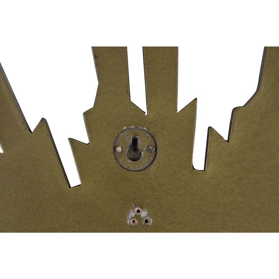 Close-up of the back of a gold sunburst wall mirror showing the keyhole mounting bracket.