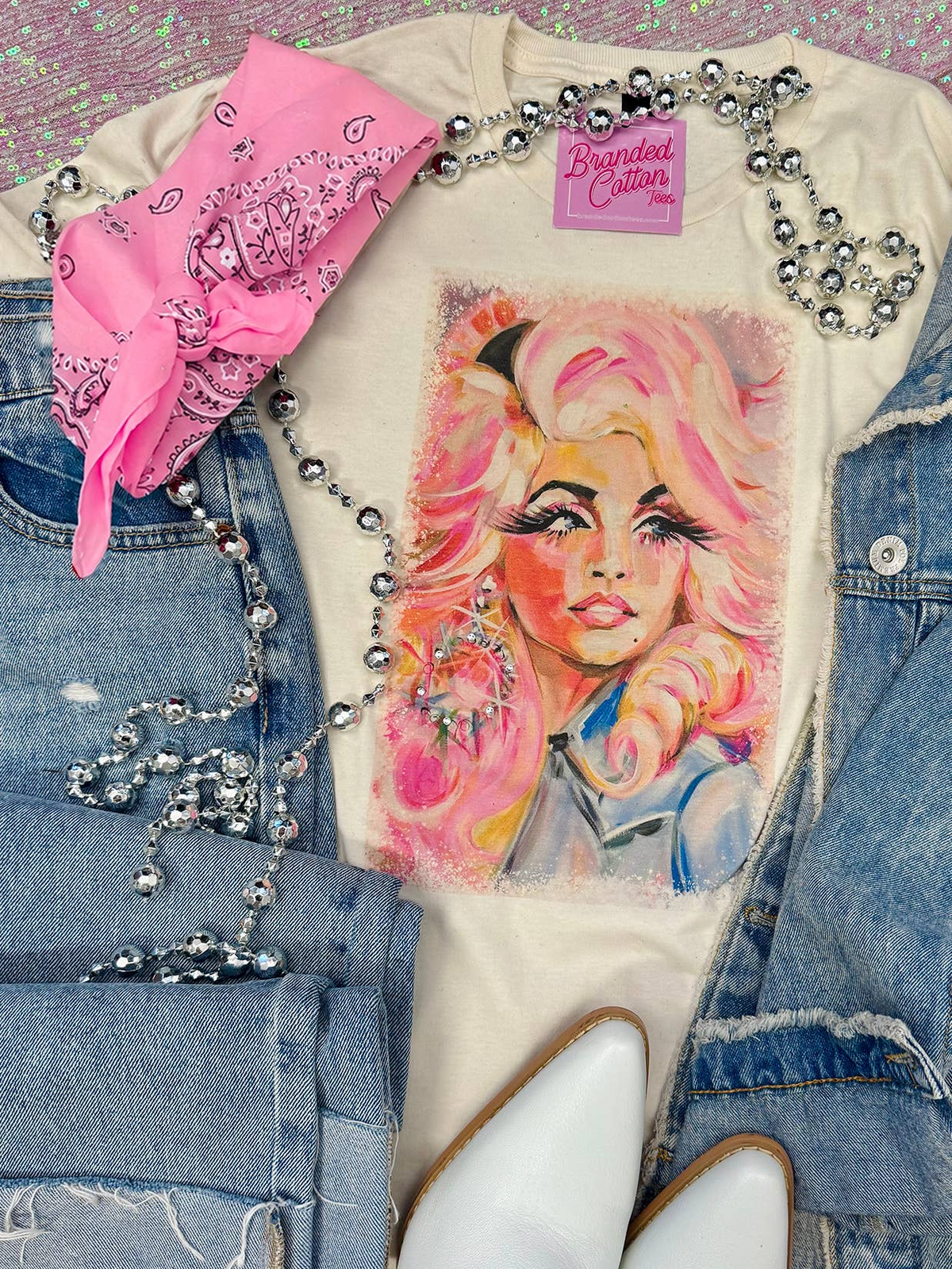 Sweet Dolly Tee featuring a colorful portrait of Dolly Parton with crystal accents.