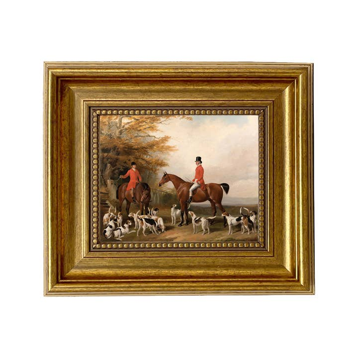 Vintage fox hunt scene painting print on canvas in a gold frame with riders and hounds.
