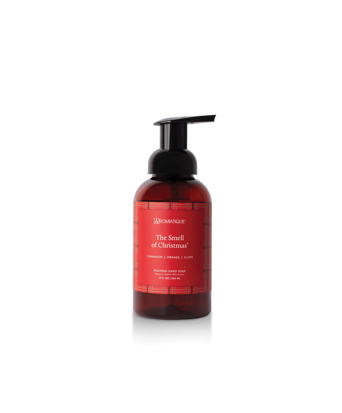 The Smell of Christmas Foaming Hand Soap in an amber bottle with a red plaid label and black pump.