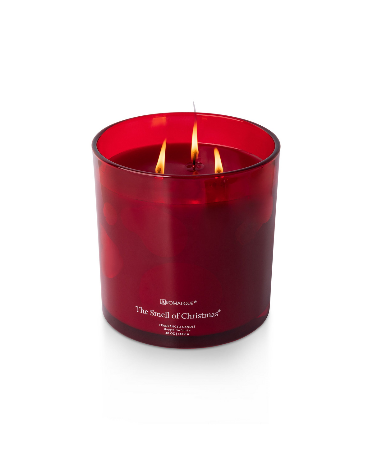 The Smell of Christmas 48 oz red glass candle with three lit wicks and red wax.