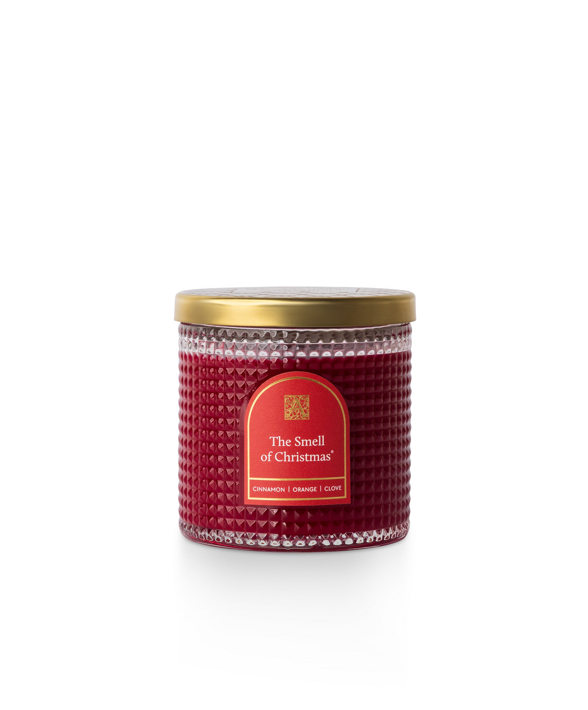 The Smell of Christmas textured red glass candle with a gold metal lid and festive label.