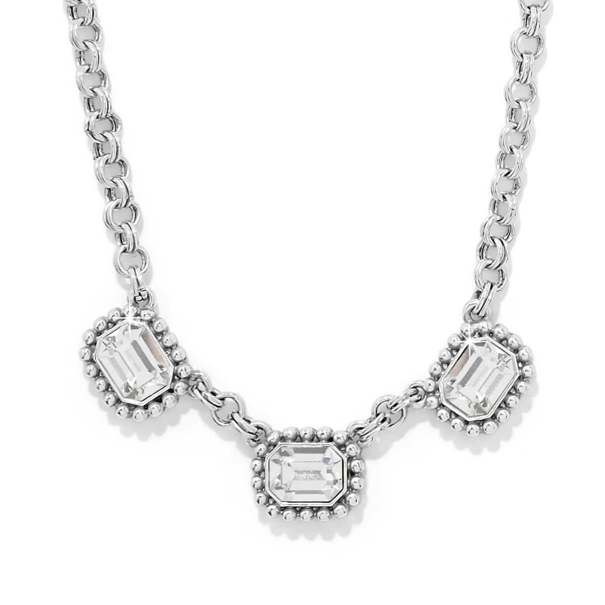 Twinkle Luxe Trio Necklace with three emerald-cut crystals in silver-plated beaded frames.