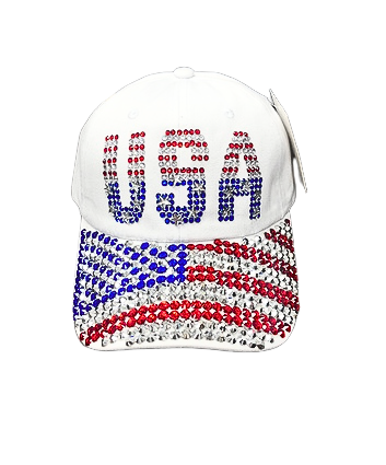White baseball cap featuring rhinestone USA lettering and an American flag design on the brim.