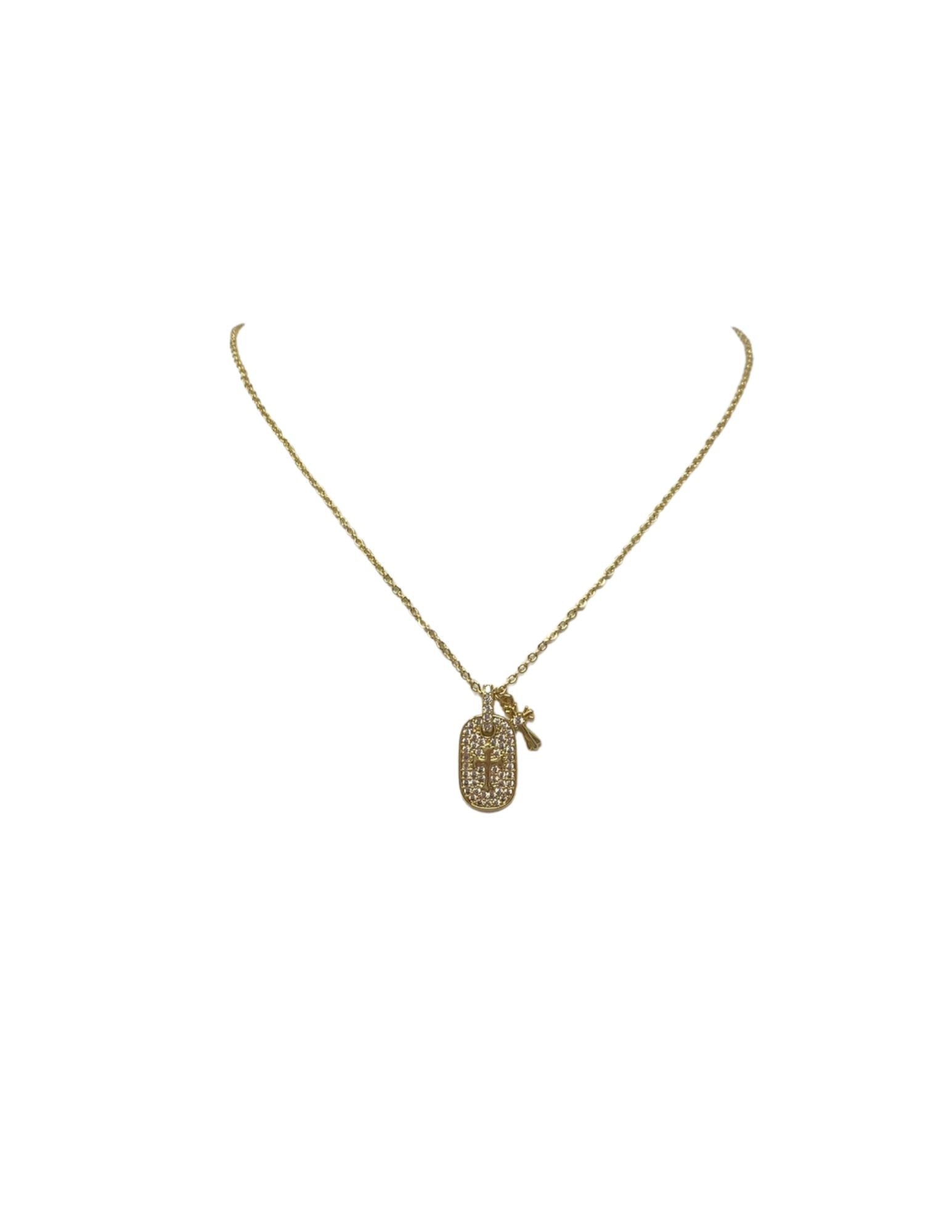 Gold necklace with a CZ pave dog tag pendant featuring a cross and a small hanging cross charm.