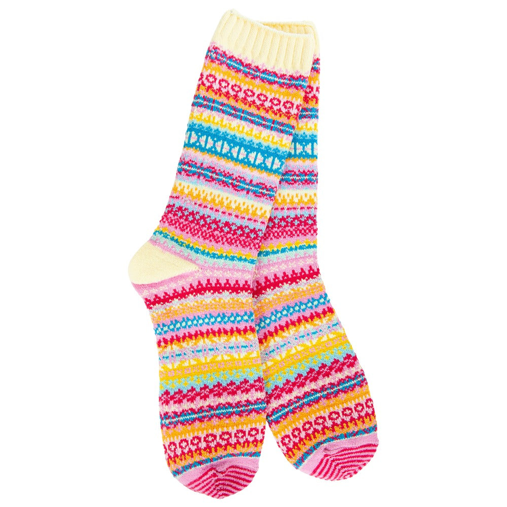 A pair of colorful Nordic-style crew socks with pink, yellow, and blue geometric patterns.