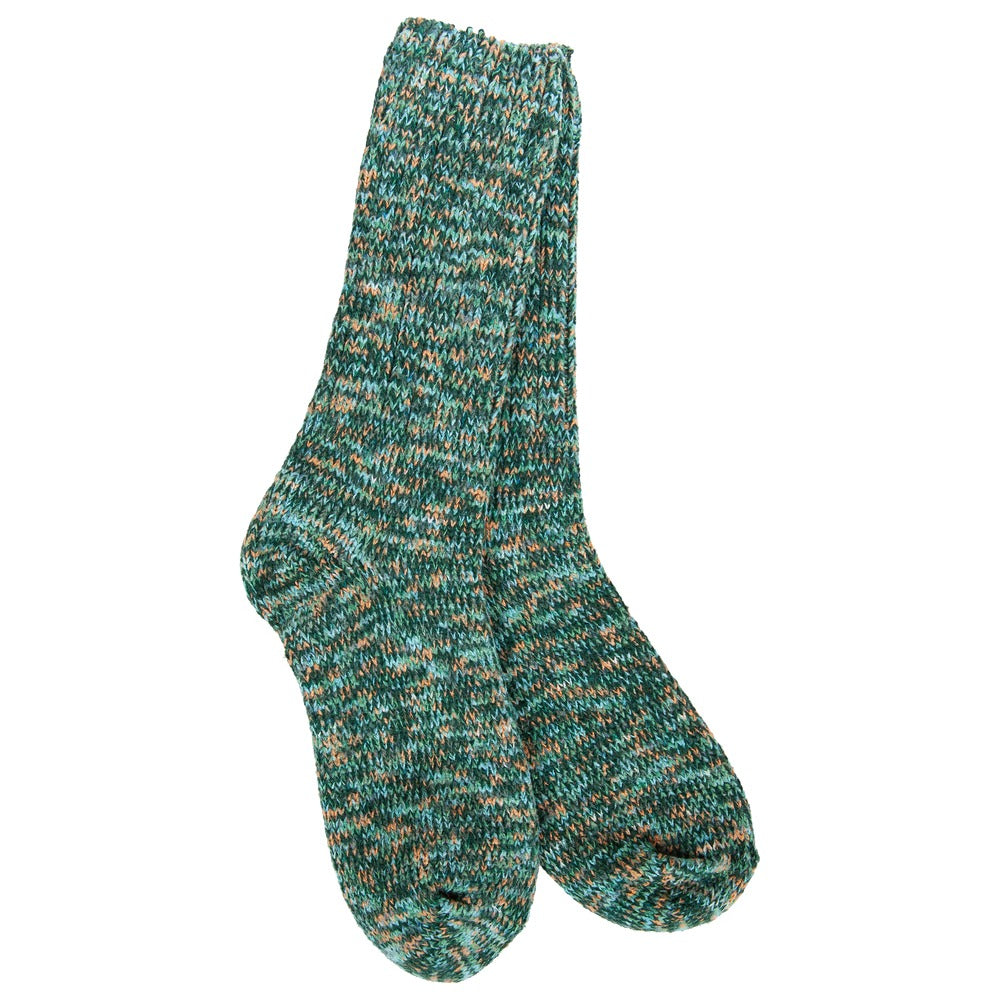 A pair of green, blue, and orange marled knit crew socks in a ragg style.