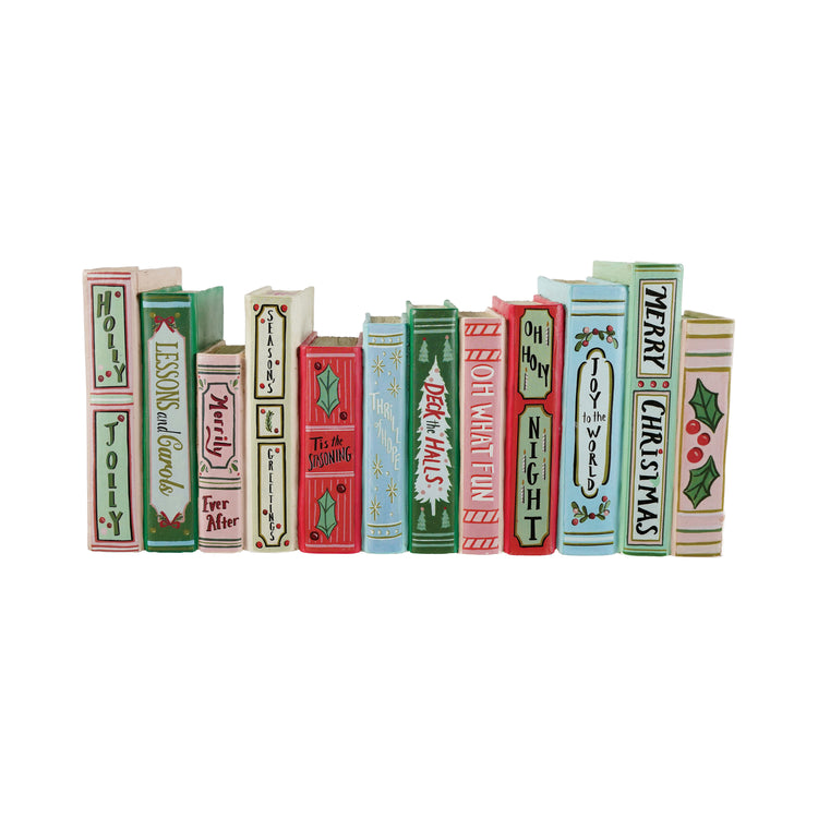 Resin holiday books decor featuring a row of colorful, festive book spines with Christmas titles.
