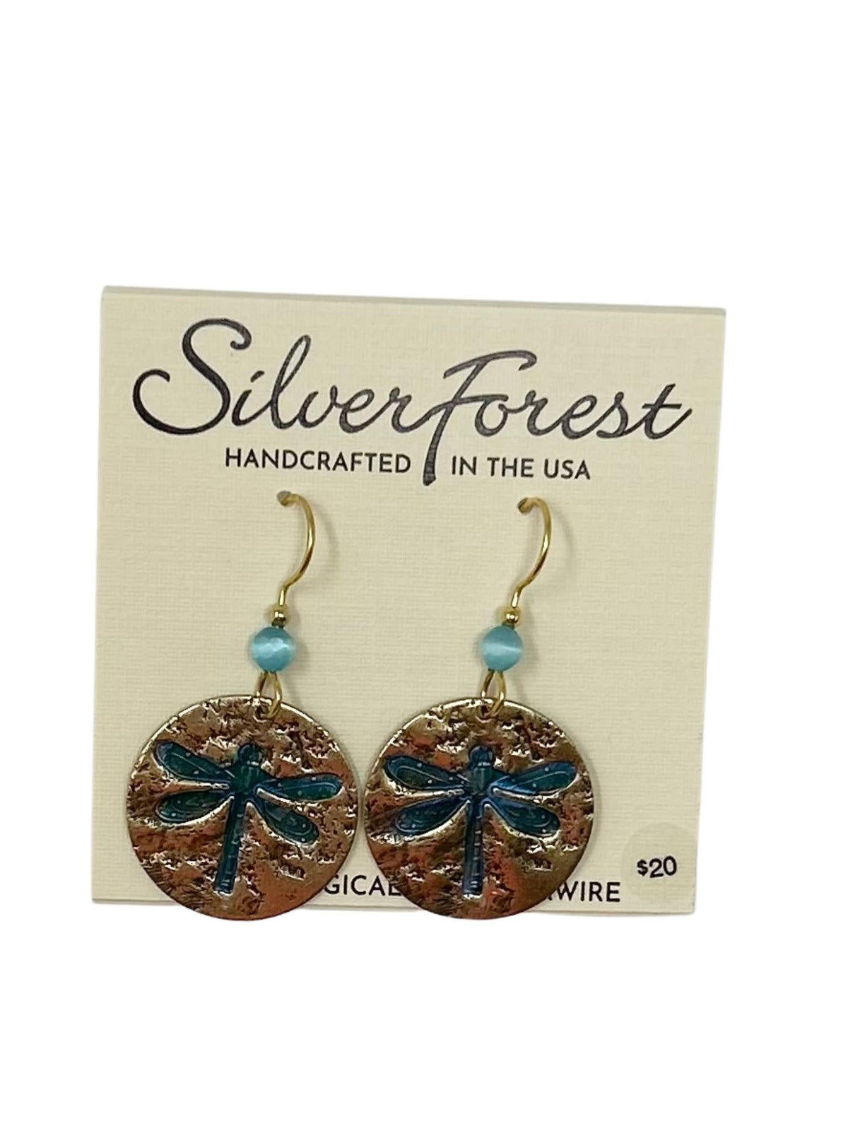 Textured disc earrings featuring a dragonfly motif with surgical steel fish hook backs.