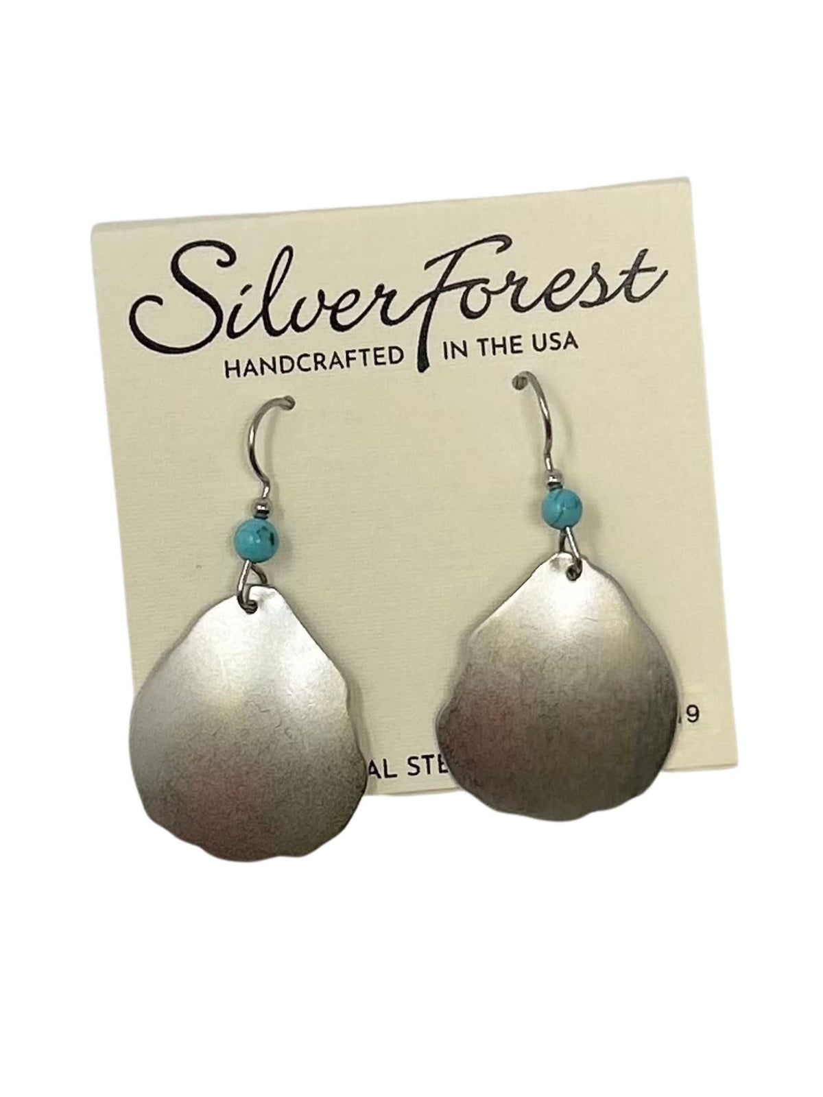 Silver-Mod teardrop earrings with a beaded accent on surgical steel fish hook backs.