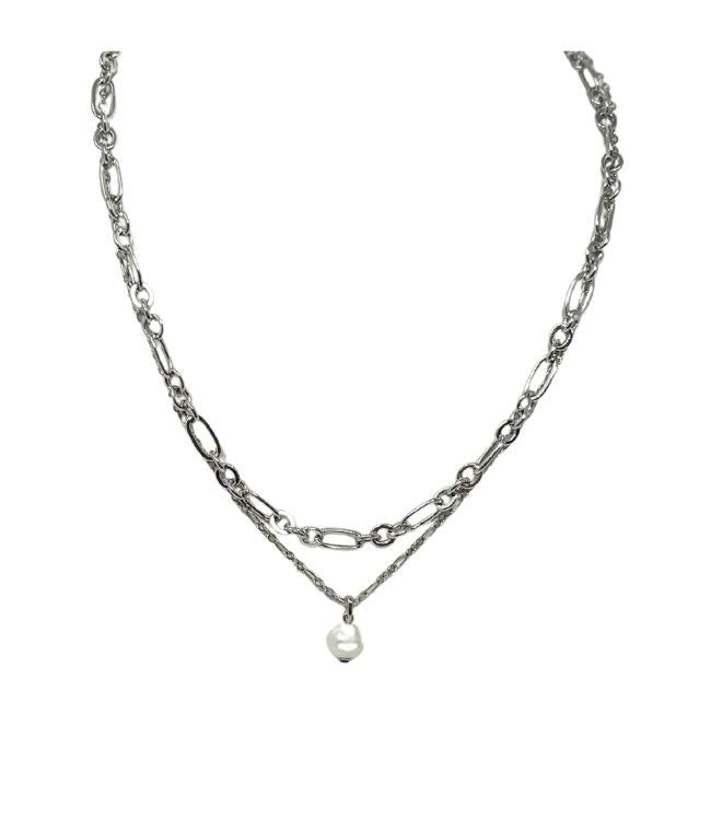 Ashton multi-strand necklace featuring layered chains in a neutral metallic finish with delicate pendant accents.