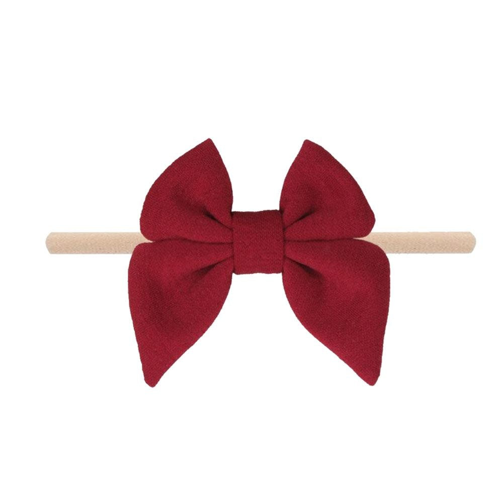 Merlot cotton baby headband with a fabric bow detail