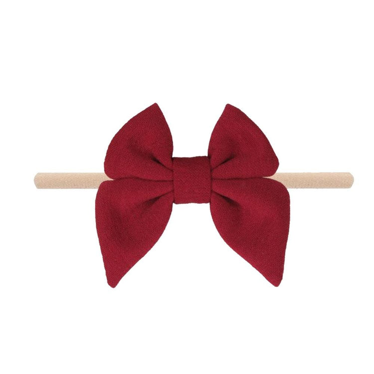Merlot cotton baby headband with a fabric bow detail
