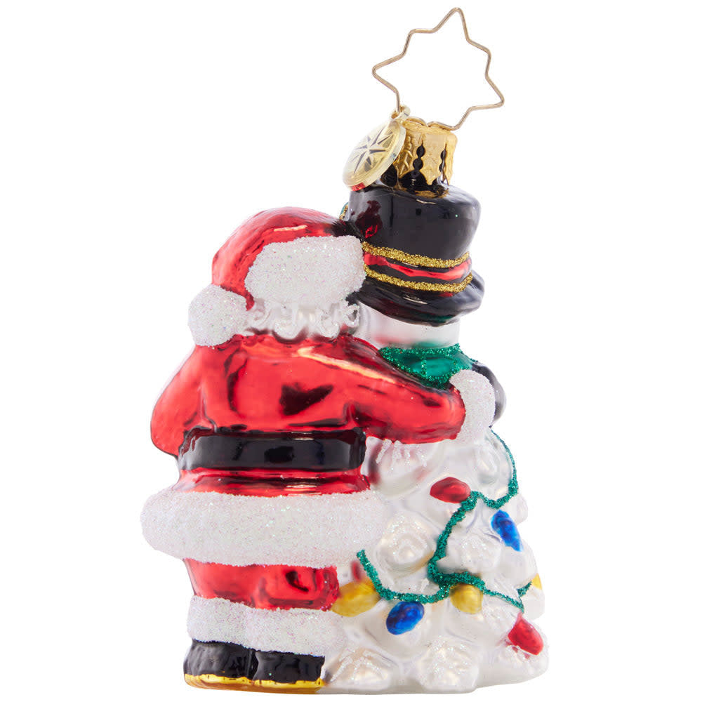 A Frosty Duo Gem resin ornament featuring a smiling Santa and snowman surrounded by wrapped gifts and Christmas lights.