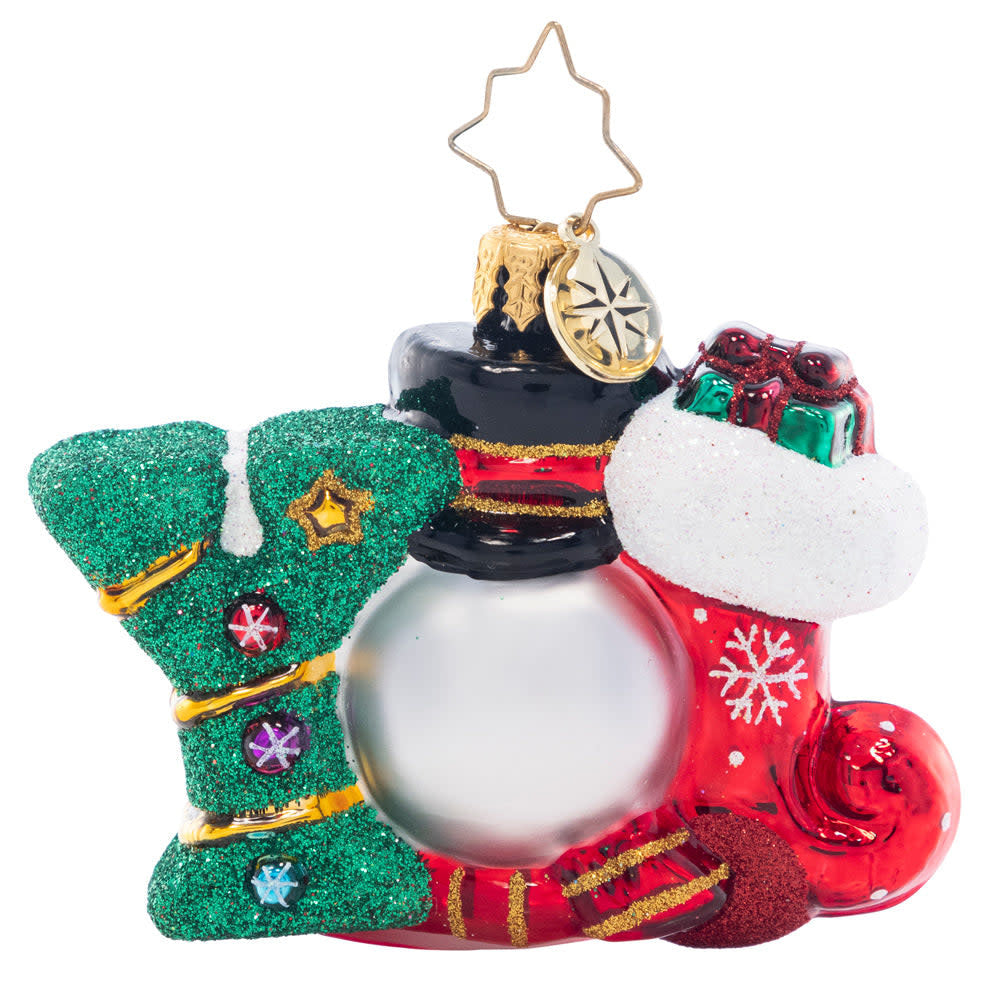 Red glass gem ornament with a smiling snowman face peeking from the top.