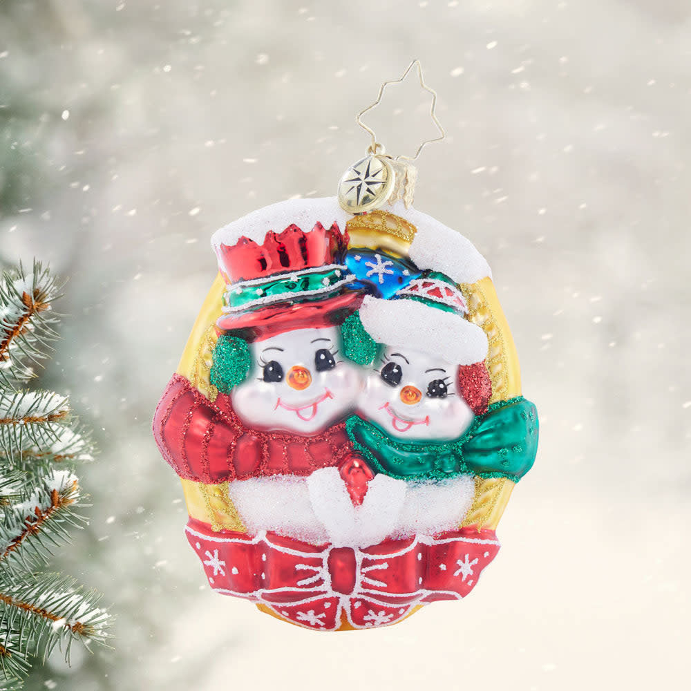 Gold-framed snowman ornament pair with bow tie