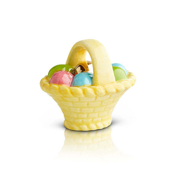 Mini woven Easter basket in natural tan with a small handle.
